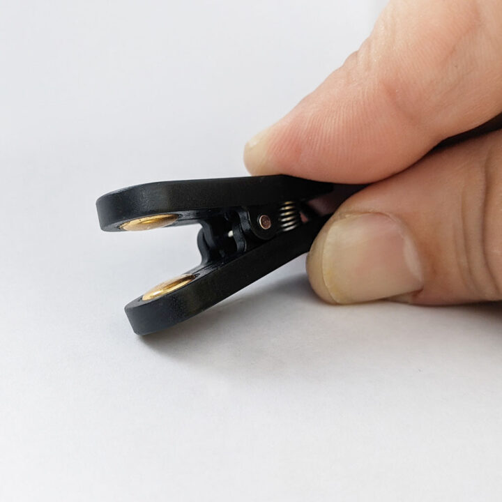 firm single auricular clip open